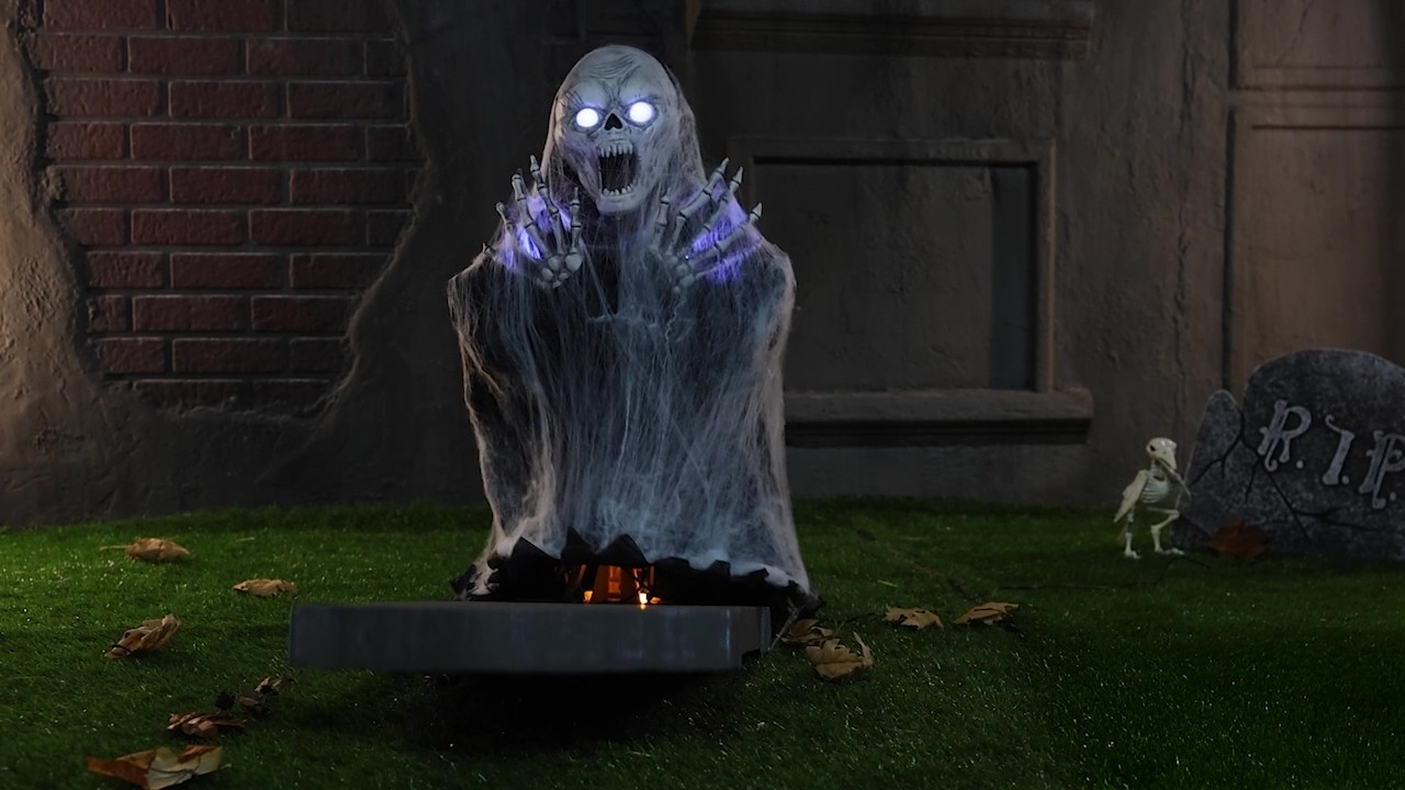 Make your haunted setup unforgettable with this exclusive 2.1FT Animated Jump Scare Skull and Tombstone Decoration! The hidden skull leaps forward with lights and sound for the ultimate Halloween jump scare.